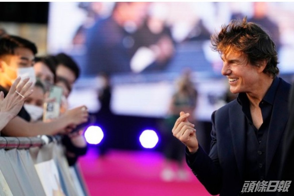 湯告魯斯好親民。